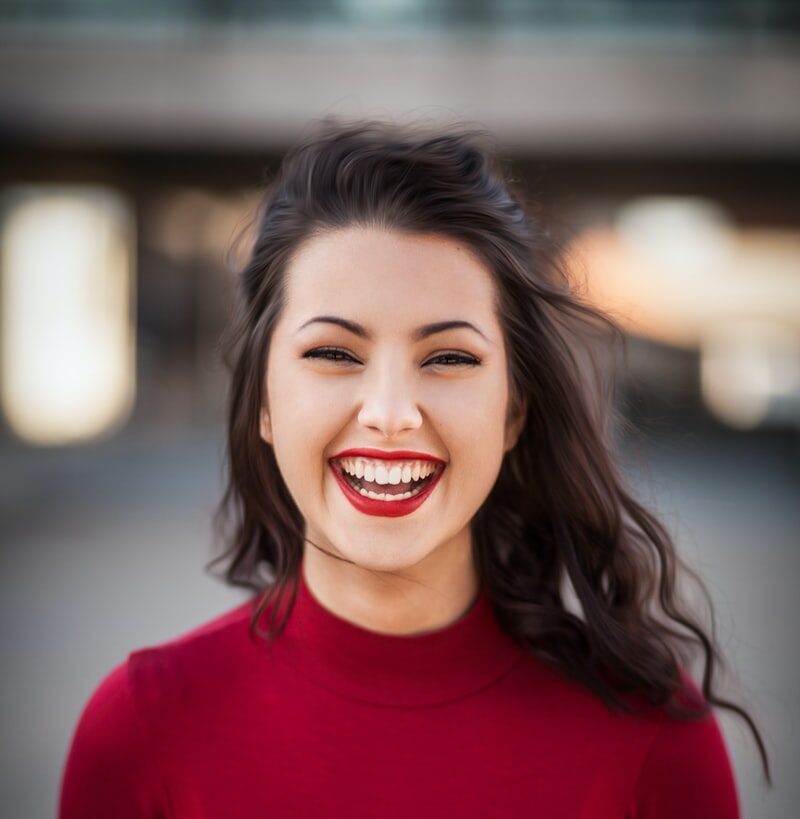 closeup photography of woman smiling